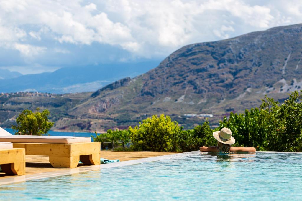 Infinity pool at Villa Artemisia overlooking Souda Bay and the mountains